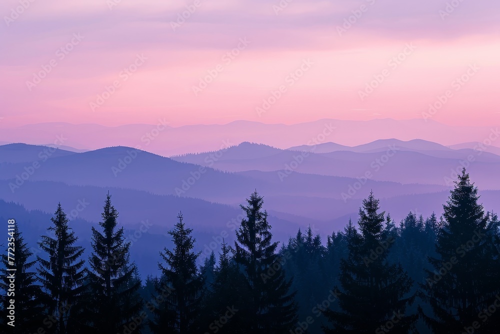 Majestic Purple Sunset Over Layered Mountain Range