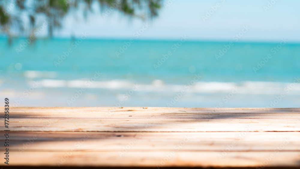 Summer product display on wooden podium at sea tropical beach
 Mock up for product display. 3D render.  Holiday summer beach background