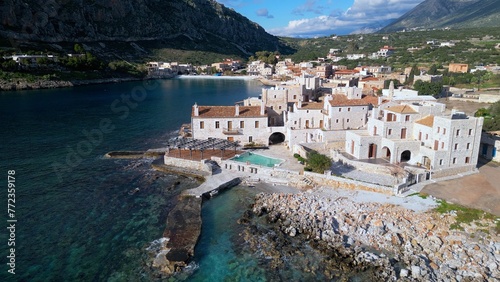 Obraz na płótnie Greece Peloponnese Gerolimenas is one of the most beautiful and traditional seaside villages of Laconia - drone aerial view of amazing Sea Village with Crystal clear blue water w salonie