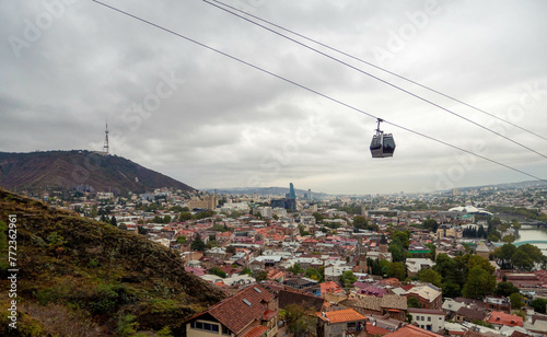 The good view of city center and cable car of Tbilisi city with beautiful sky, Georgia.