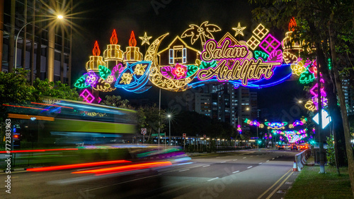 Geylang Serai Lights Up 2024: Celebrate Ramadan Holy Month of Muslims with Vibrant Street Decorations, Busy Roads Car Passing, and Festivities in Singapore, Eid Mubarak, Salam Aidilfitri Hari Raya  photo