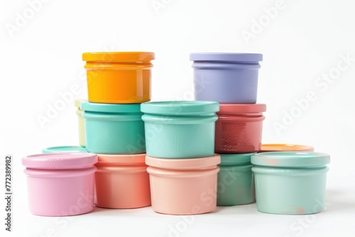containers with pastel paint with space for logos or text Isolated on solid white background