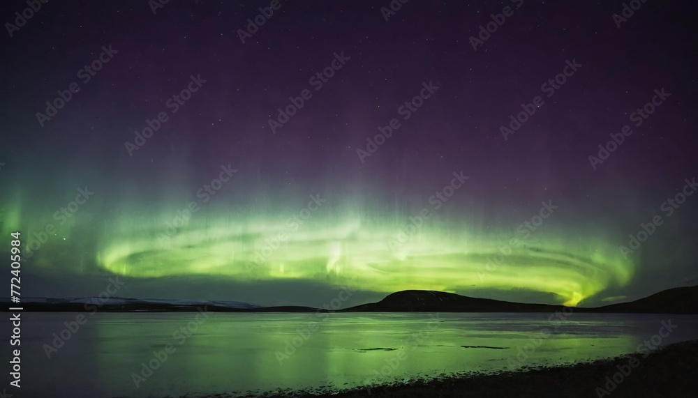 Spectacular vibrant green Aurora Borealis illuminating night sky mesmerizing dance Northern Lights