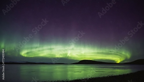 Spectacular vibrant green Aurora Borealis illuminating night sky mesmerizing dance Northern Lights © V.Semeniuk