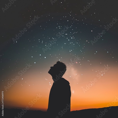 The silhouette of a person looking up at a sky glow, illustrating the human connection to the night and what we lose to light pollution no dust photo