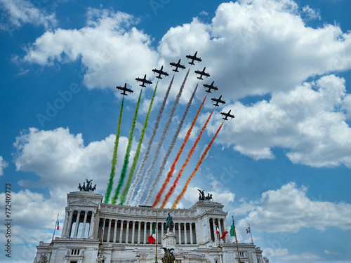 Italian National Republic day Air show aerobatic team frecce tricolore flying over altare della patria in Rome, Italy photo
