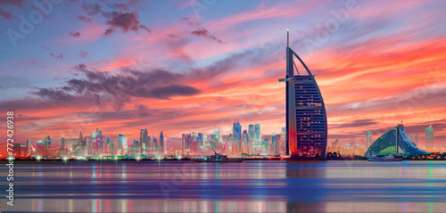 Vászonkép Sunrise Hues Reflecting on Dubai Skyline with Burj Al Arab and Jumeirah Beach Ho