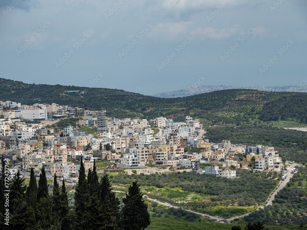 view of the city, Arab villages at its foot, neighborhood Nazareth, Israel	