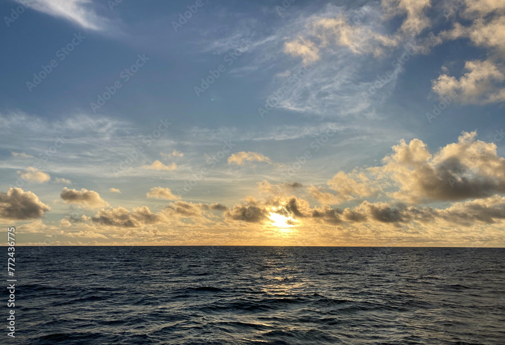 Beautiful ocean sunset in offshore New Jersey near windfarms