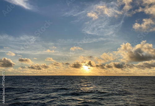 Beautiful ocean sunset in offshore New Jersey near windfarms