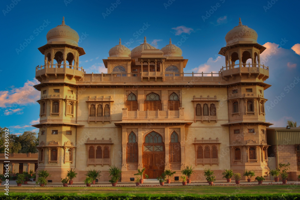 Elegant Rajasthani Palace with Symmetrical Design, Chhatris, and Intricate Carvings, India at Sunrise