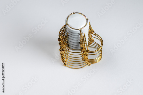 Wire capsules or gold foil for sparkling wine champagne