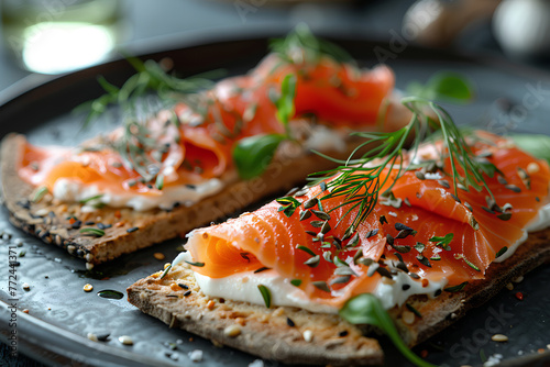 Gourmet smoked salmon on toast with cream cheese and dill, a savory treat.