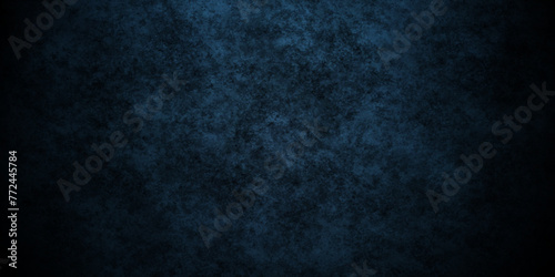 Dark and light blue wall grunge backdrop texture. watercolor painted mottled blue background, modern colorful concrete dirty smooth ink textures on black paper background. © MdLothfor