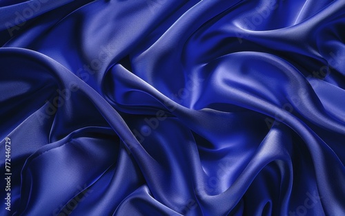 Dramatic navy blue satin with sensuous folds and curves exuding an air of sophistication and elegant allure.