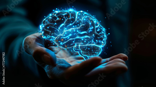 Hand presenting a glowing digital brain concept in dark surroundings, depicting advanced technology and intelligence.