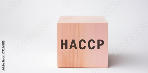 HACCP word on wooden block in white background with copy space