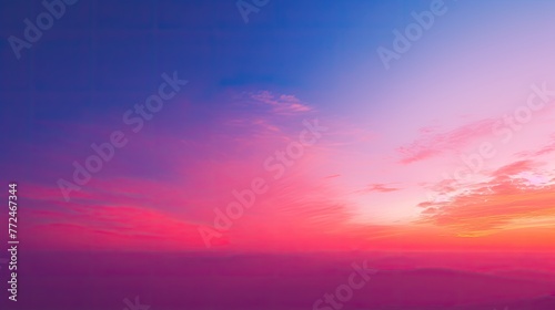 A sunset gradient with vibrant pinks, oranges, and purples, gradually fading into a deep indigo night sky © DayByDayCanvas