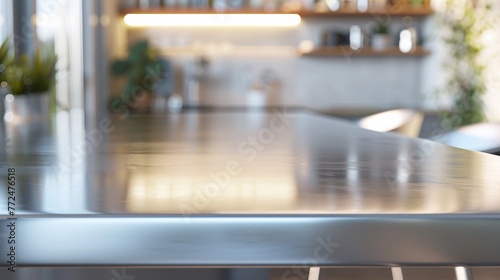 An empty stainless steel countertop in a modern kitchen. Template showcase scene for advertising products