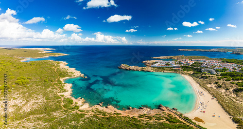 Areal drone view of Arenal de Son Saura beach at Menorca island, Spain © Martin Valigursky