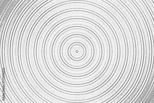 Abstract radial halftone texture. Monochrome background of black dots on white. Dotted background design for various purpose.