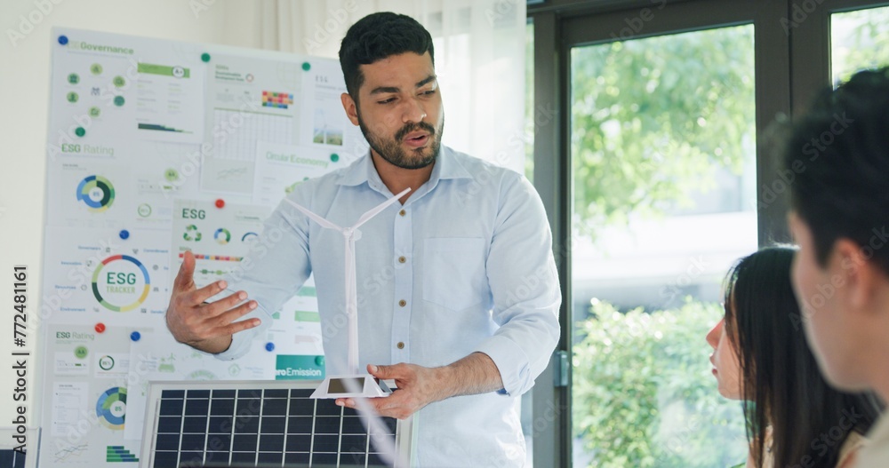 © tirachard - Group diverse Asia businesspeople talk ESG strategies risk management workshop, SDGs report, global warming, green finance and investment and net zero waste lifestyles in boardroom training building.