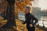 a mature woman jogging early morning , life styles , practice sport and healthy habits concept
