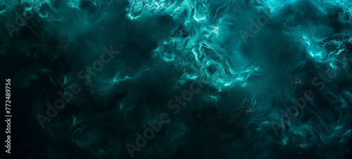 Top view texture of bioluminescent plankton in a darkened ocean emitting a soft blue-green glow that illuminates the water like a starlit sky