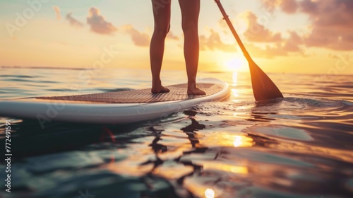 woman balancing on a paddle board