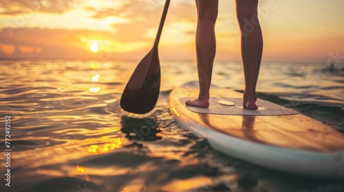 woman balancing on a paddle board