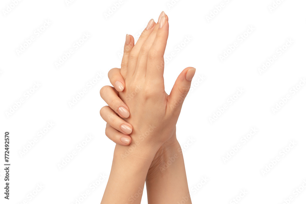 Fototapeta premium Woman hands isolated on a white background. Nude nail polish.