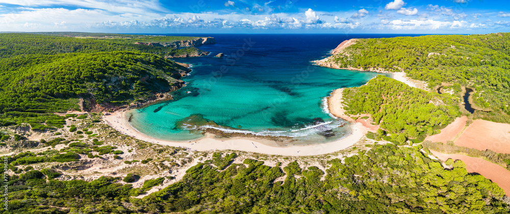 Fototapeta premium Aerial drone view of Menorca beach at cala de Algariens, Spain