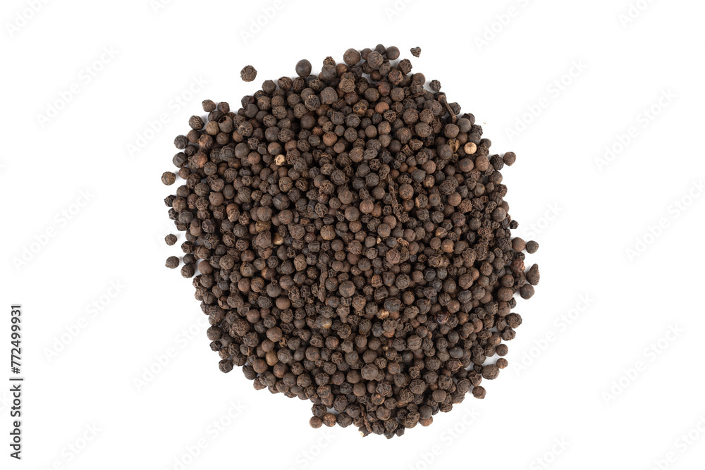 Top view of a pile with black unground pepper peas on a white background. Top view of a pile with black unground pepper peas on a white background.