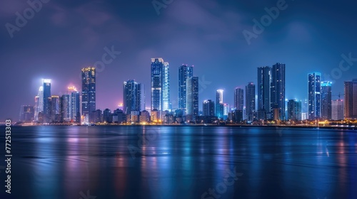 Xiamen Skyline at Night: Stunning City Landscape with Architecture, Skyscrapers, and Panoramic Sky View © Serhii