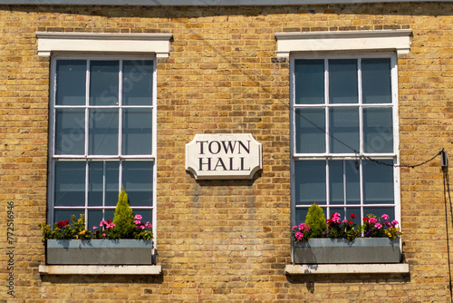 June 2023, Ware, Hertfordshire, UK: View of the old town hall with flower boxes