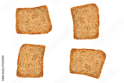 Very delicious wheat-rye bread with sunflower seeds - view of four slices of bread on a white background