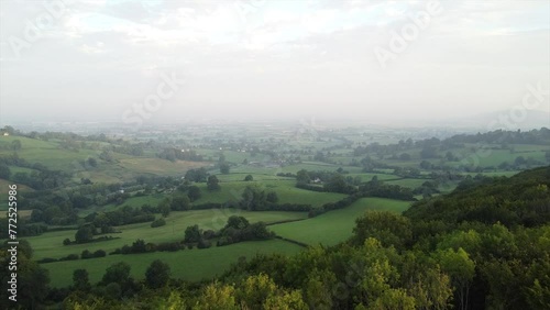 Drone scene over English countryside footage with misty skies in Gloucestershire, Haresfield photo