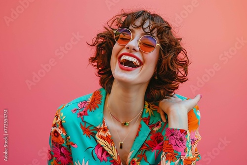 a young cheerful woman laughing in vivid 70s fashion against a solid colored backdrop © Tasriv