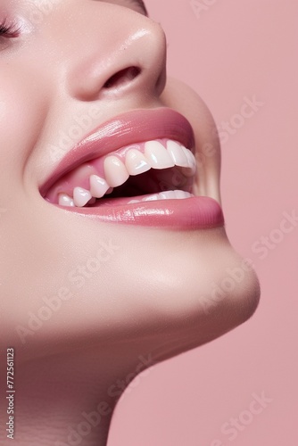  A timeless beauty radiates joy with a dazzling white smile, bathed in a soft, elegant pink glow. Discover the transformative power of our teeth whitening service