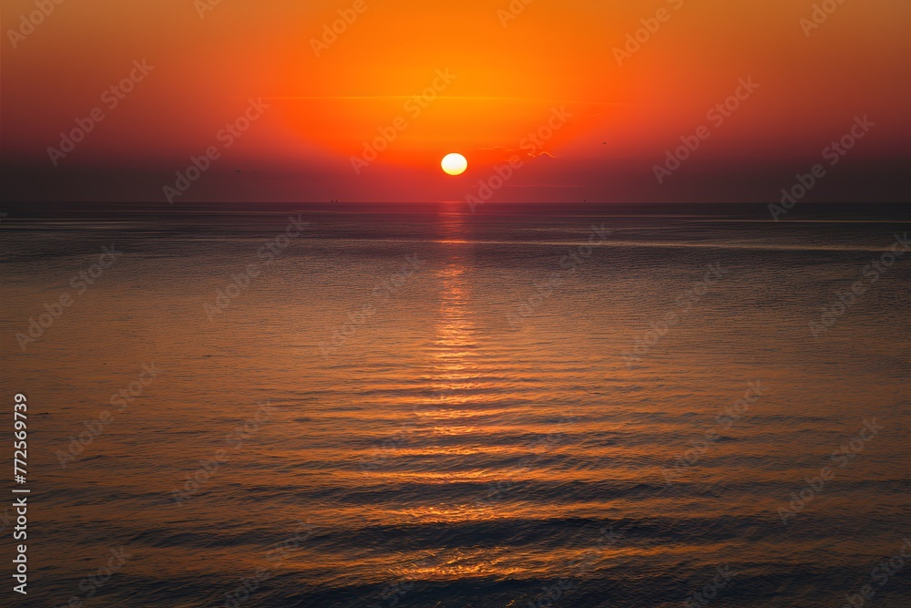 Image Aerial view captures serene sunset over calm sea