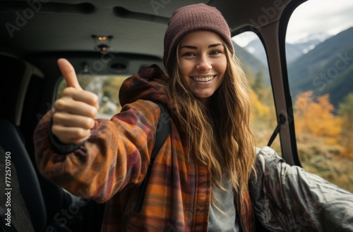 Nature-Infused Road Trip Adventure: Hikecore Girl Giving Thumbs Up photo