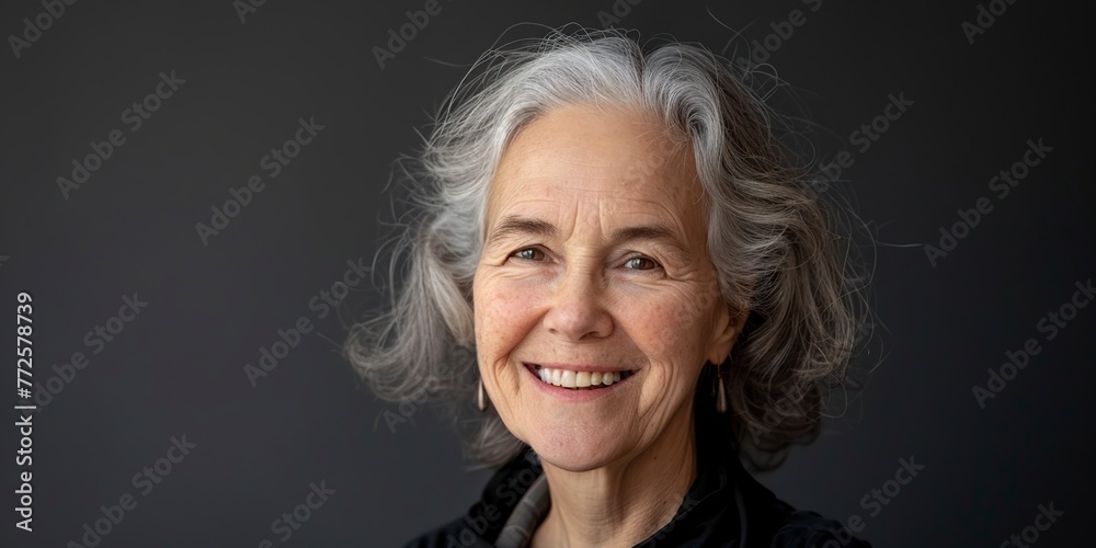 older woman with gray hair looking at the camera older woman with gray hair looking at the camera