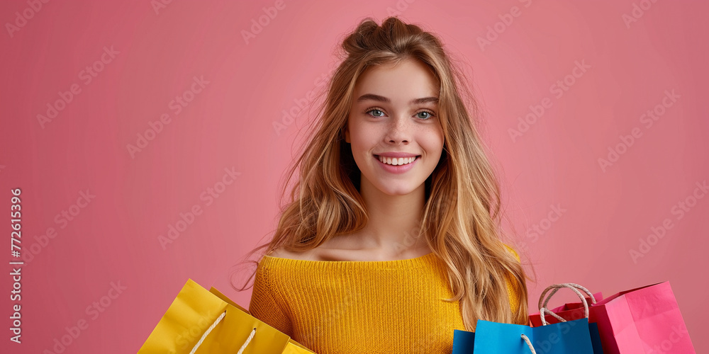 Happy young woman with shopping bags on pink background. Shopping concept. Happy young woman with shopping bags on pink background. Shopping concept.