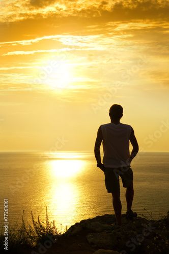 silhouette of man on the sunset © Andrii Salivon