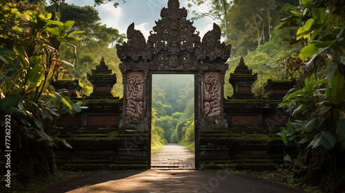 Ancient temple gate in the middle of the jungle with bright light shining through photo