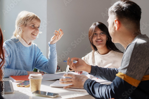 Quadro su tela A group of focused students actively engage in academic discussions, illustratin