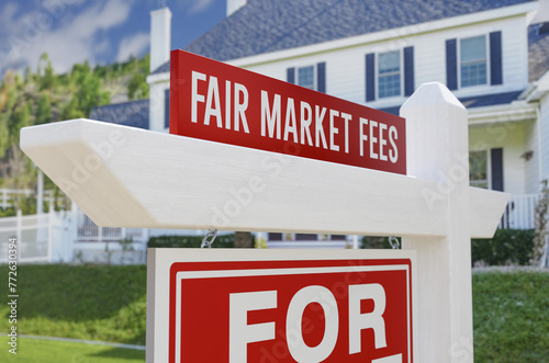 Fair Market Fees For Sale Real Estate Sign In Front Of New House. photo