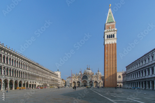 Almost empty San Marco square with Basilica and Tower on a sunny winter day, Venice, Veneto, Italy