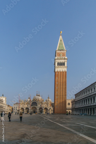 Almost empty San Marco square with Basilica and Tower on a sunny winter day, Venice, Veneto, Italy