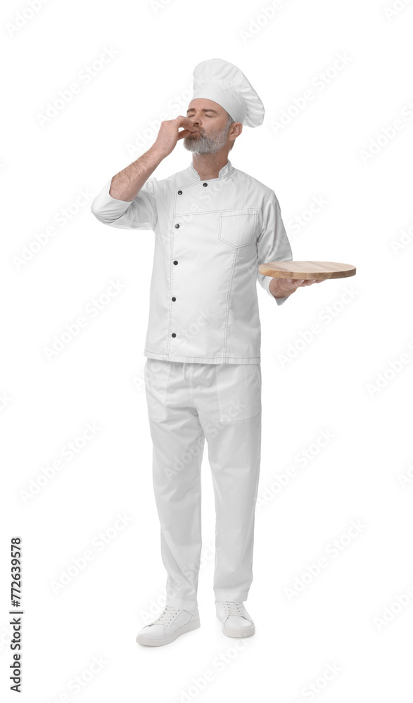 Chef in uniform with wooden board showing perfect sign on white background Chef in uniform with wooden board showing perfect sign on white background